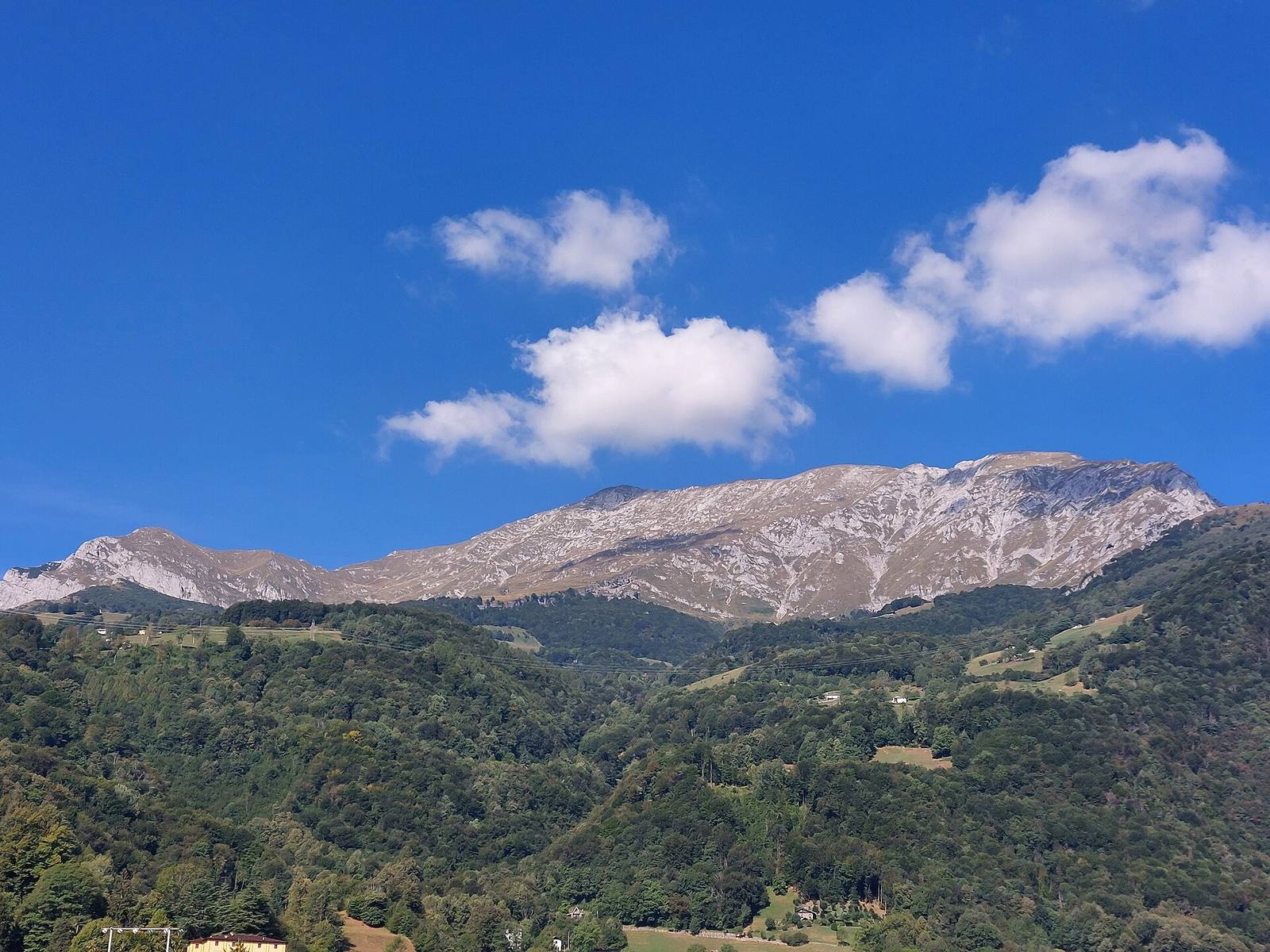The Grigna Settentrionale, known as the Grignone, seen from Pasturo: the slope above Alpe Cova is popular hiking terrain in Valsassina.